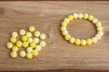 Load image into Gallery viewer, yellow tie-dye silicone bead bracelet kit
