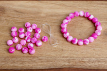 Load image into Gallery viewer, pink tie-dye silicone bead bracelet kit