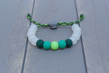Load image into Gallery viewer, Translucent adjustable silicone bead bracelet on multi-green paracord