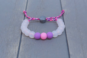 translucent  adjustable silicone bead bracelet on pink and purple paracord