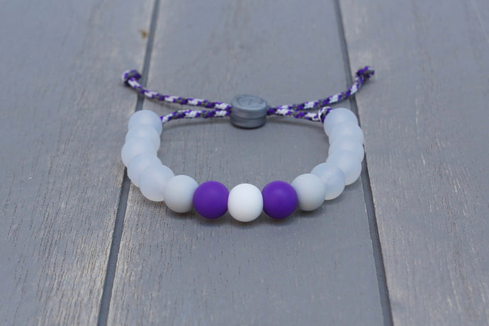 translucent  adjustable silicone bead bracelet on purple camo paracord