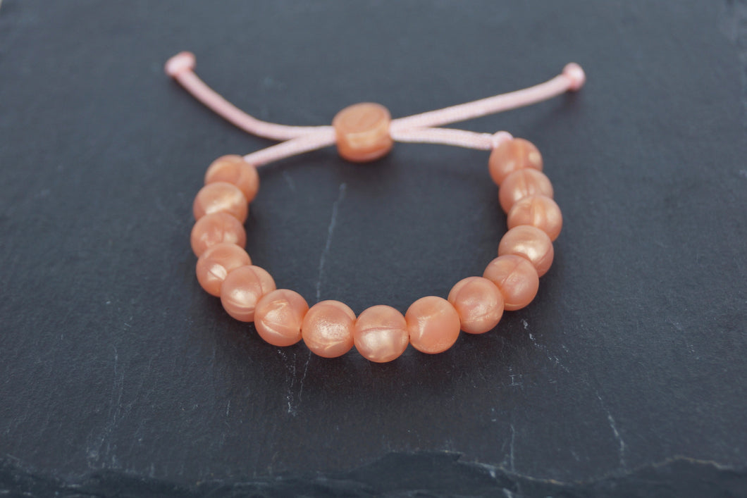 rose gold metallic adjustable silicone bead bracelet