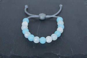Translucent and metallic white and blue adjustable silicone bead bracelet