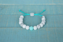 Load image into Gallery viewer, marble with turquoise accent bead adjustable silicone  bracelet