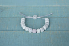 Load image into Gallery viewer, white marble with lilac accent bead adjustable silicone bracelet