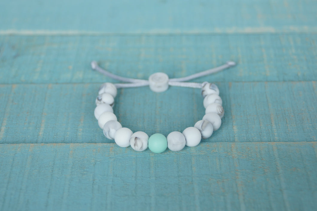 White marble with mint accent bead adjustable silicone bracelet