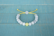 Load image into Gallery viewer, White Marble with yellow accent bead adjustable silicone bracelet