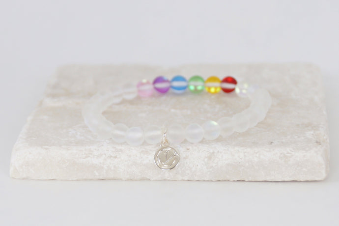 white and rainbow moonstone bracelet on elastic