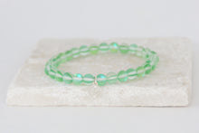 Load image into Gallery viewer, Green moonstone bracelet on elastic 