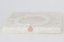 Load image into Gallery viewer, White moonstone bracelet on elastic with rose gold tag