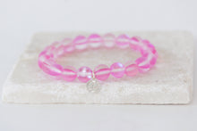 Load image into Gallery viewer, pink moonstone bracelet on elastic
