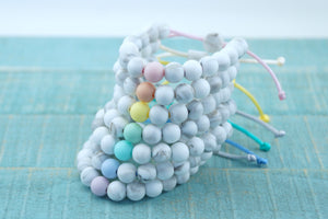 White marble with pastel accent bead adjustable silicone bracelets