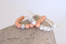 Load image into Gallery viewer, set of 2 peach and white marble adjustable silicone bead bracelets