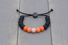 Load image into Gallery viewer, black and orange ombre adjustable silicone bead bracelet